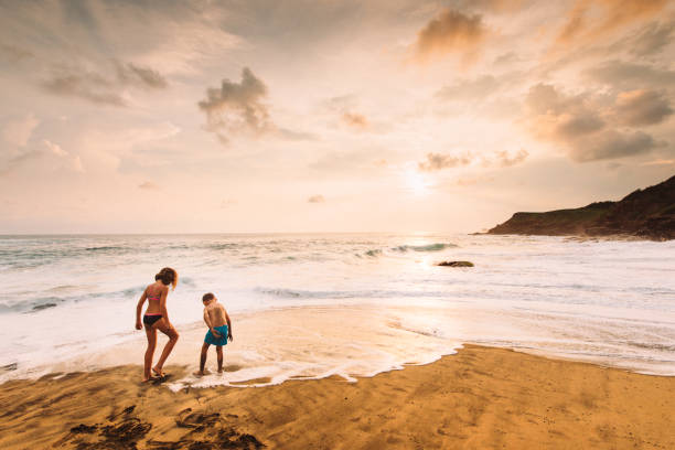 istock Siblings Playing at the Beach in Mexico 919176126