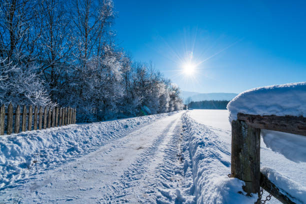 istock star shaped sun over winter landscape with snow 919178992