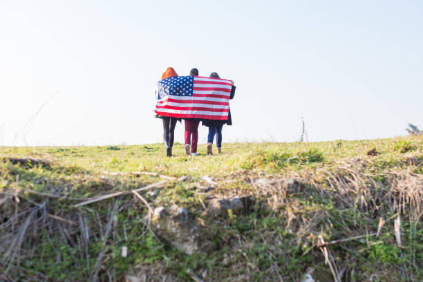 istock Two girls with USA flag. 919183198