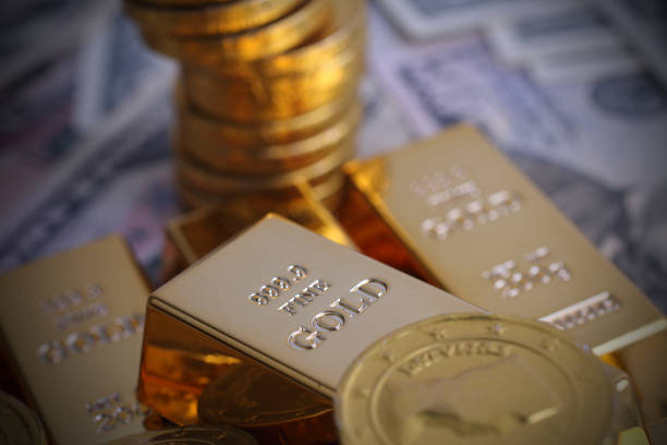 istock Gold coins with gold ingot 919195462