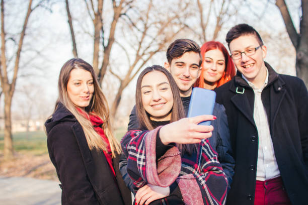 istock Group of young people taking selfie. 919243886