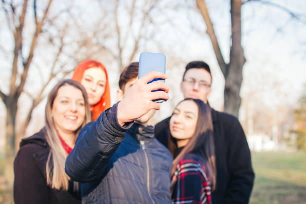 istock Beautiful young people take selfie. 919250660