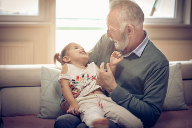 istock Grandfather and granddaughter. 919275142
