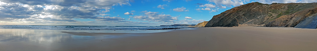 Panorama from a remote beach at praia Vale Figueiras in Portugal