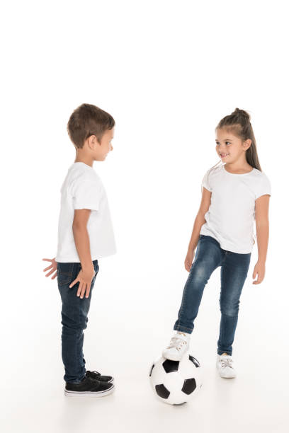 istock kids with soccer ball 919291438