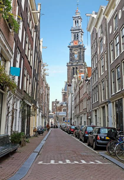 Amsterdam in the Jordaan with the Westerkerk in the Netherlands Amsterdam in the Jordaan with the Westerkerk in the Netherlands jordaan amsterdam stock pictures, royalty-free photos & images