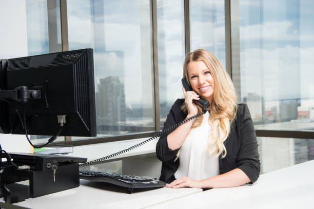 istock Business Women At Her Desk 919317982