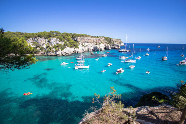 istock Boats and yachts on Macarella beach, Menorca, Spain 919323250