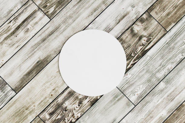 istock Round coaster on wooden background 919323480