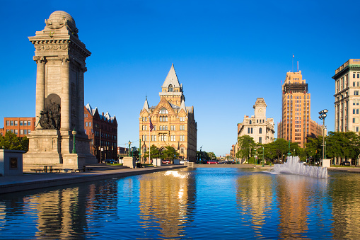 View of historic buildings and fountain, Syracuse New York at Clinton Square.