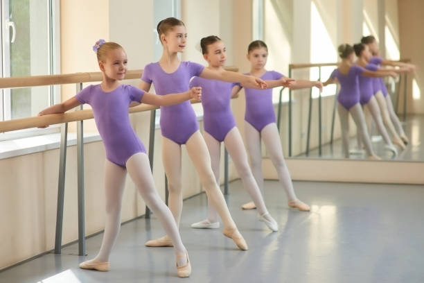 istock Young ballerinas having rehearsal at ballet school. 919351648
