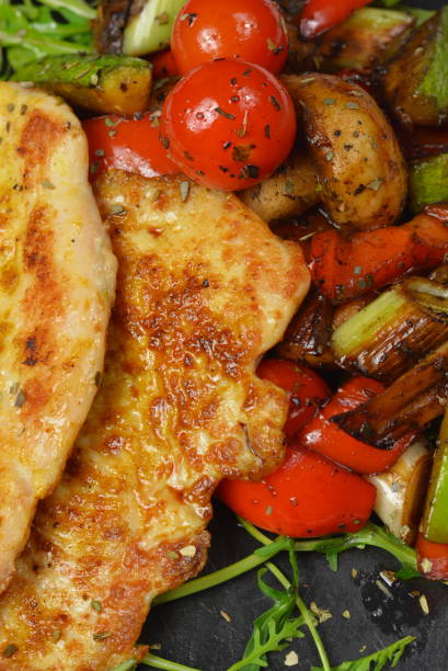 istock Tasty Grilled Chicken Meat with Vegetables 919352566