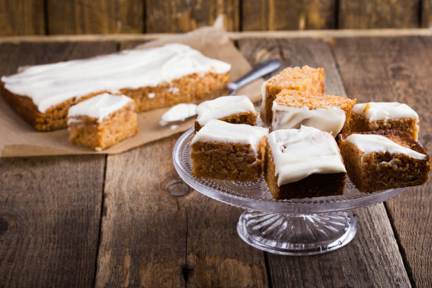 Fall Baking - Slice of pumpkin,pecan, and coconut cake with ingredients.  Please see my portfolio for other food and drink images.