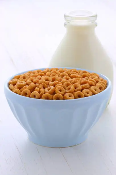 Delicious and nutritious lightly toasted breakfast honey nuts cereal loops on vintage styling