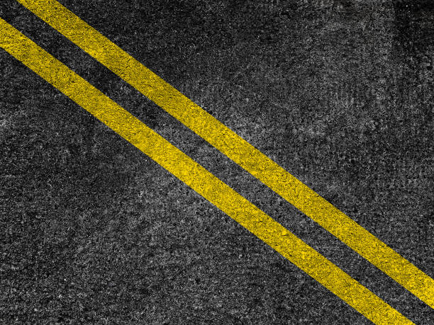 istock Asphalt road with double yellow lines 919381982