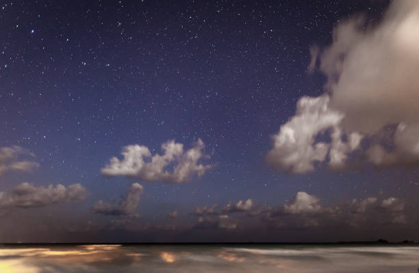 istock Sky full of stars above the ocean. 919384924