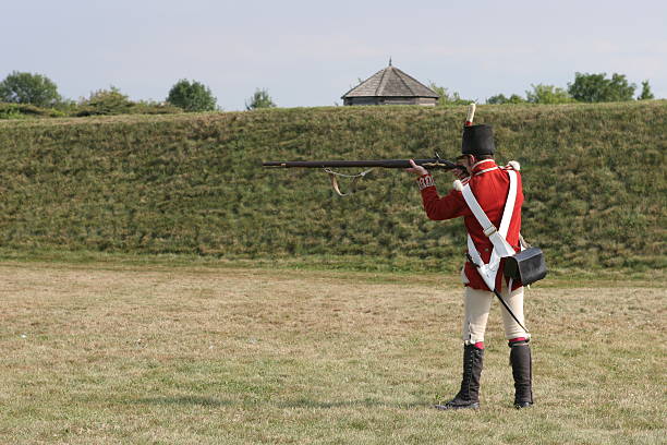 istock Nineteenth century British soldier preparing to fire 91938703