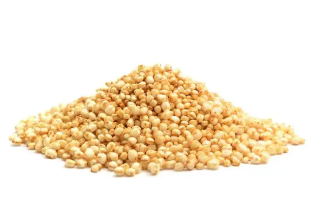 Puffed quinoa isolated on a white background.