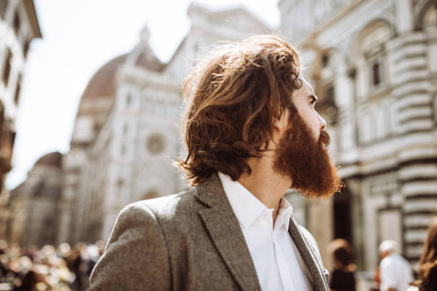 istock long beard hipster in the city 919407400