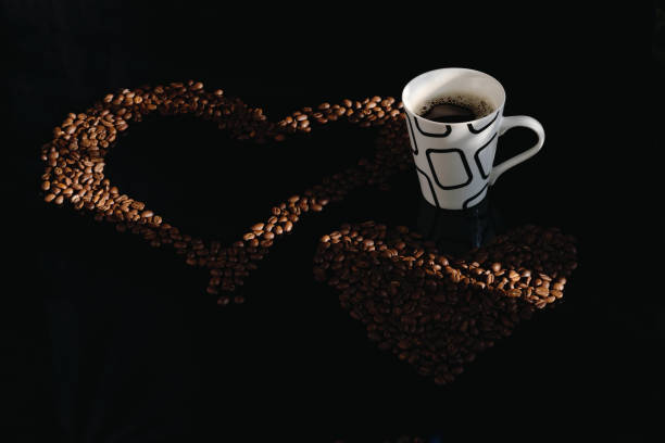 istock White cup of coffee and coffee beans. 919412466
