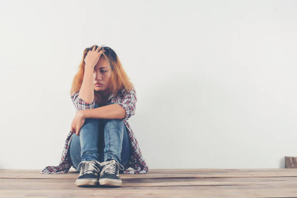 istock Sad woman hug her knee,nobody 919418452