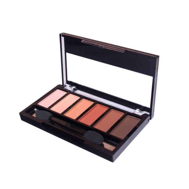 istock Palette of eye shadow isolated on white background. Samples of brown make-up 919421274