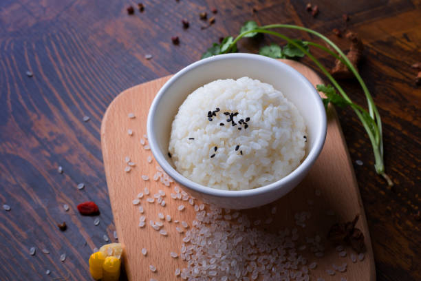 a bowl of rice stock photo