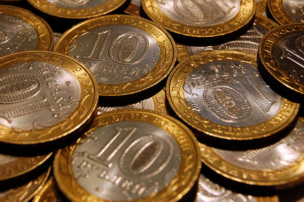 denaro - number 10 gold business paper currency foto e immagini stock
