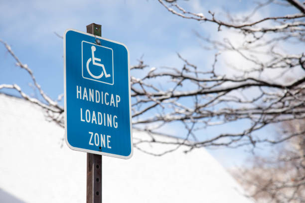 istock Handicap loading zone sign in the wintertime 919440186
