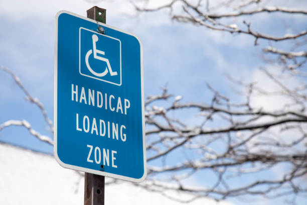 istock Handicap loading zone sign in the wintertime 919440206