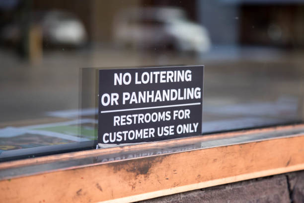 istock No loitering or panhandling sign in a shop window 919440342