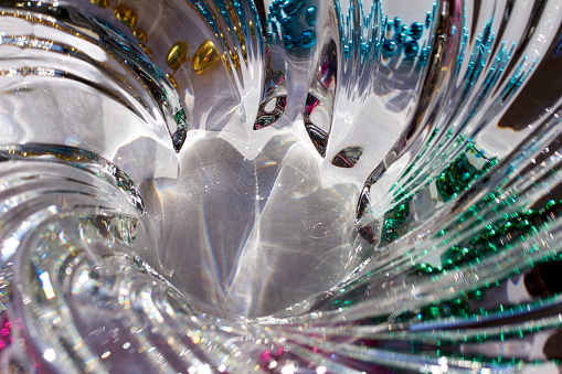 A pile of glass drinking glasses