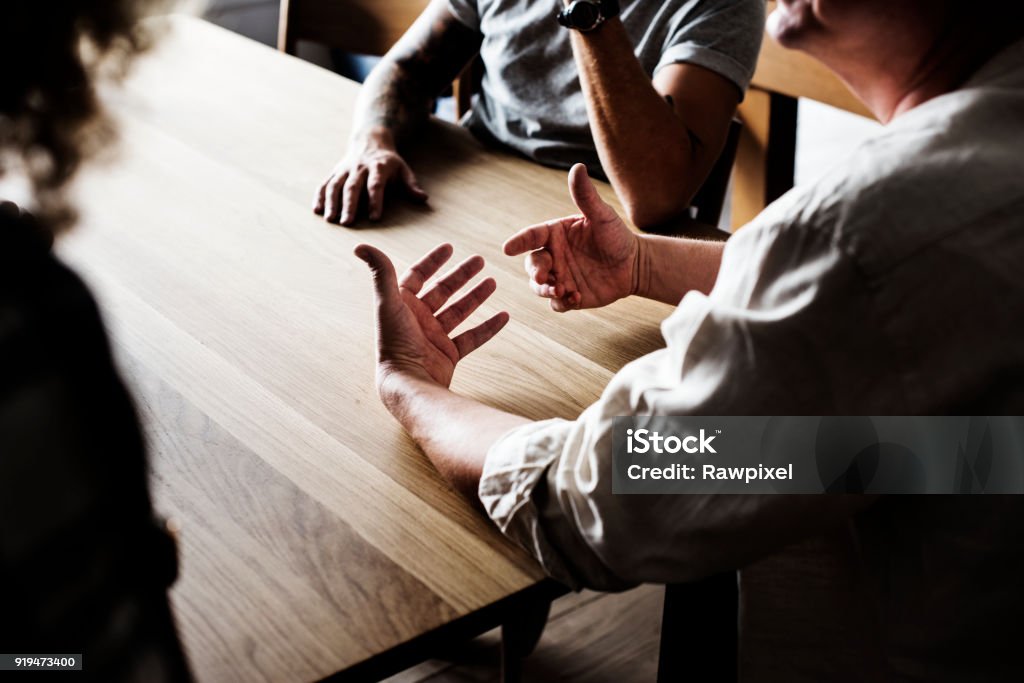 Diverse friends gathering together Meeting Stock Photo