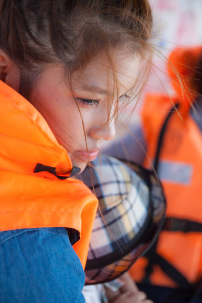 istock The girl in life jacket 919475870