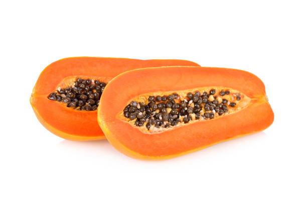istock half cut ripe papaya with seeds on white background 919475884