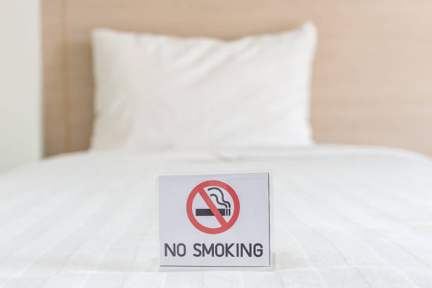 istock NO SMOKING Sign on the bed in hotel room 919475964