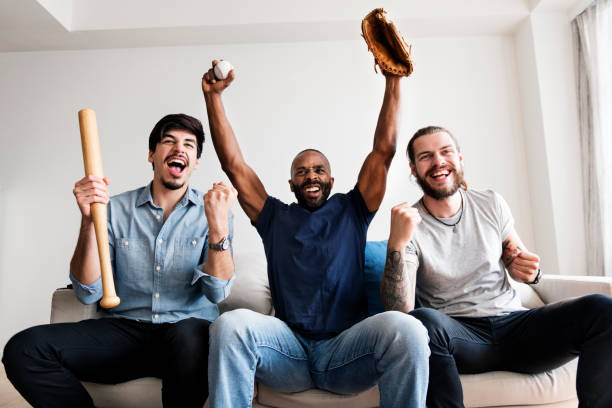 istock Friends cheering sport league together 919478746