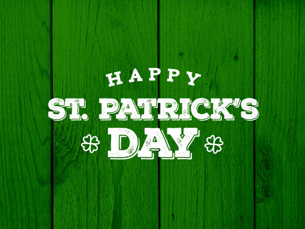 istock Happy St. Patrick's Day Text Over Green Wood Texture 919483660
