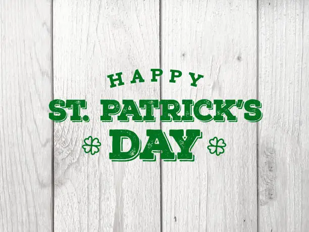 Happy St. Patrick's Day Text Over Whitewashed Wood Texture Background
