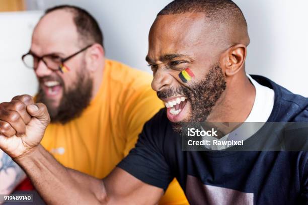 Friends Cheering World Cup With Painted Flag Stock Photo - Download Image Now - Soccer, Belgium, Fan - Enthusiast