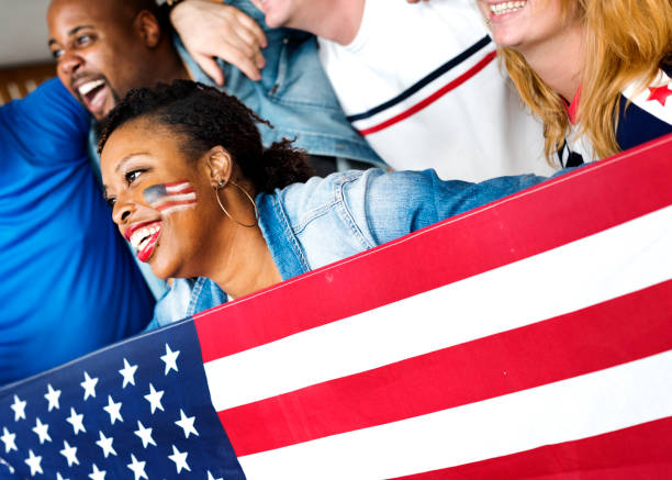 istock Friends cheering world cup with painted flag 919489380