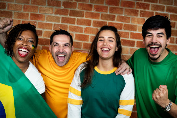 istock Friends cheering world cup with painted flag 919491482