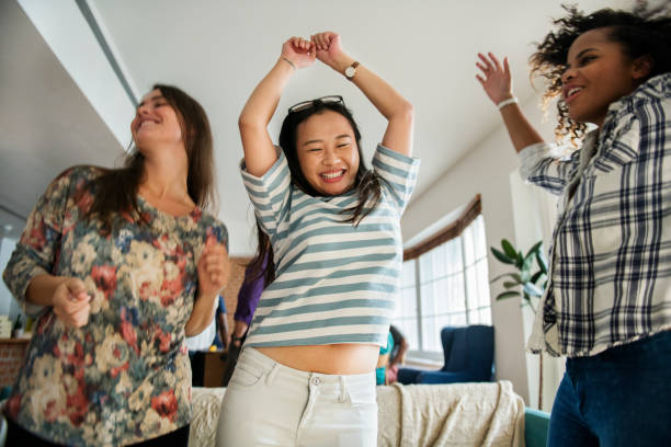 istock Diverse women dancing together 919494170