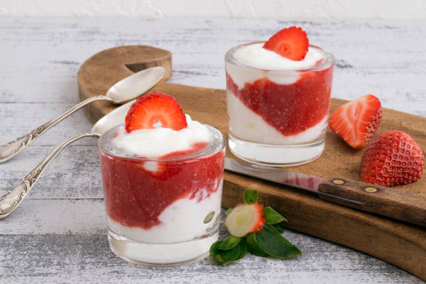 istock Natural homemade yogurt on a light background. 919494290