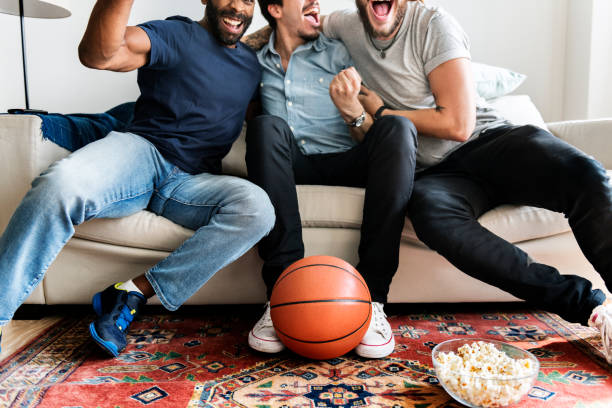 istock Friends cheering sport league together 919496956