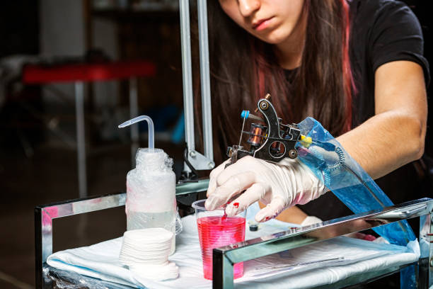 istock professional tattoo artist 919499388