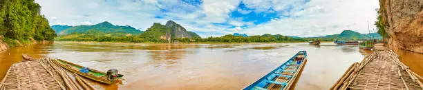 Photo of Touristic boats. Beautiful landscape panorama, Laos.