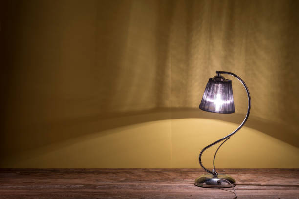 istock elegant table lamp on a wooden table 919504608