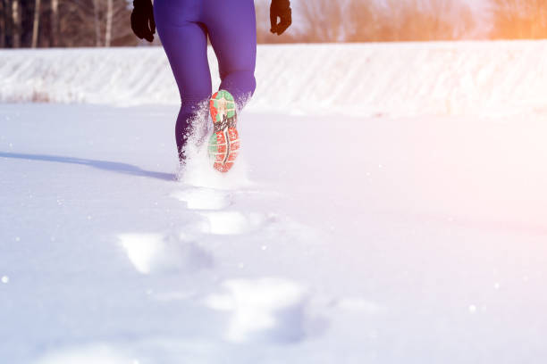 istock Young woman running 919507360