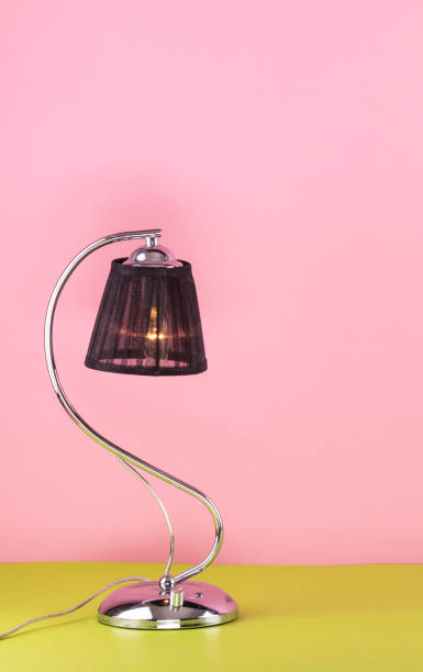 istock elegant table lamp on a pink background 919510022